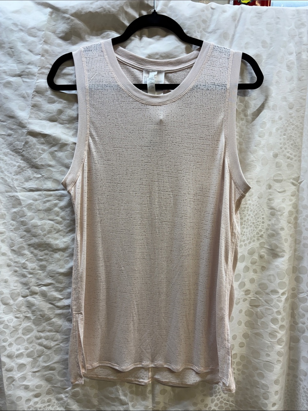 Lululemon Uncovered (burnout) Tank Top in a light pink color, Silk Rose- size 6